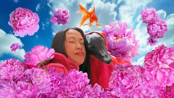 Lucy and Dawn snuggle with faces close together, surrounded by a riot of bright pink peonies, blue sky with white fluffy clouds in the background, and a lone goldfish suspended in mid-air hovering above their heads.